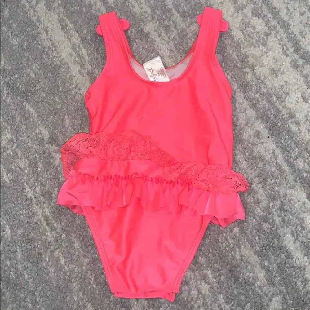 Neon pink one piece swimsuit w/ lace ruffle skirt and bows snaps 9 month